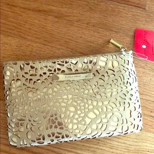 Ivanka Trump gold clutch bag